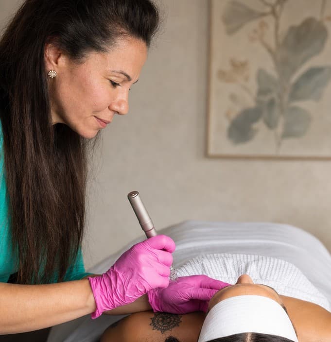 Federica Mingotti, L.Ac., placing an acupuncture needle with focused care